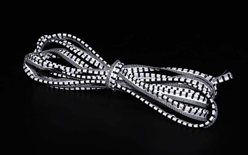 segmented-reflective-piping-tape-with-black-printed-stripes