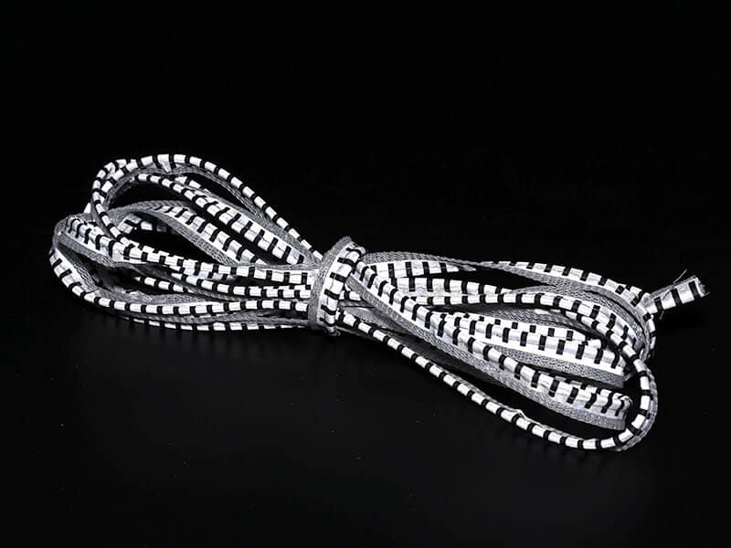 segmented-reflective-piping-tape-with-black-printed-stripes